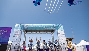 A smiling woman with sunglasses