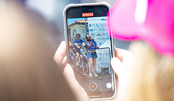 Several happy Team Kory members wearing Team Kory swag