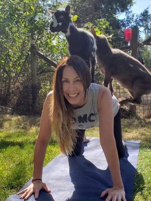 Lara, doing what she loved - with goats!